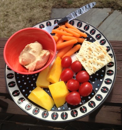 Snack: crackers, hummus, baby carrots, tomatoes, mango